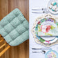 aqua dining chair cushions at dining table decorated for easter