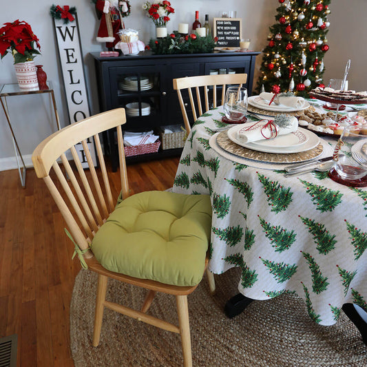 thick green dining chair pads in dining room decorated for christmas