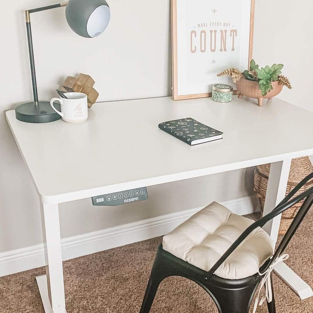 white cotton desk chair cushion on metal chair