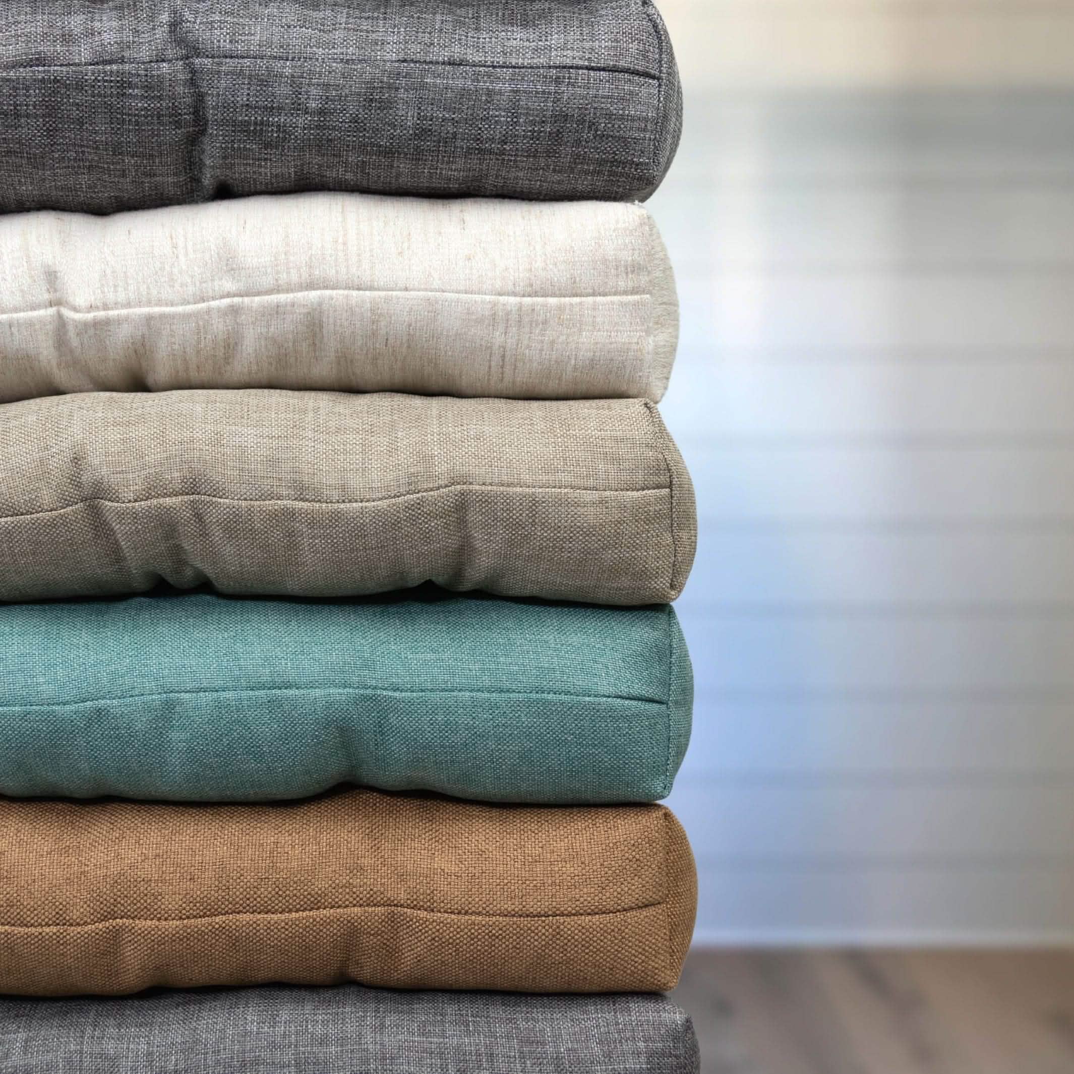 Stack of Cushions | Hayden Grey, Hayden Beige, Granite Natural, Hayden Turquoise, Hayden Copper