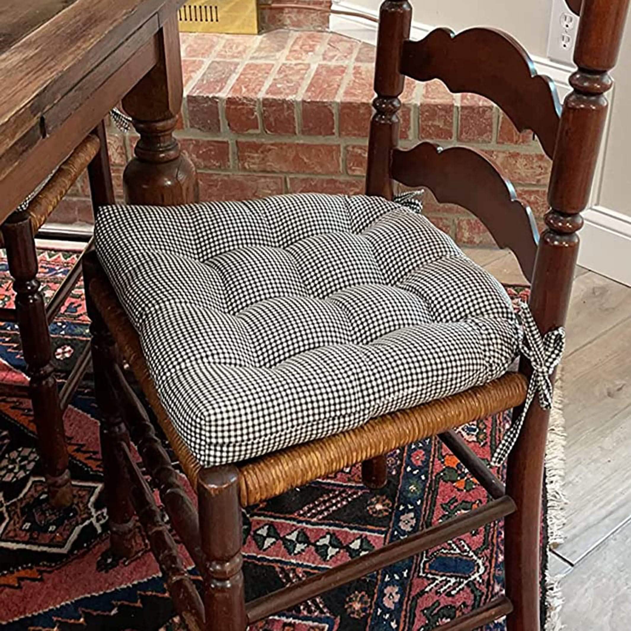 Madrid Black Gingham dining chair cushions showing reversible pattern and latex foam fill construction