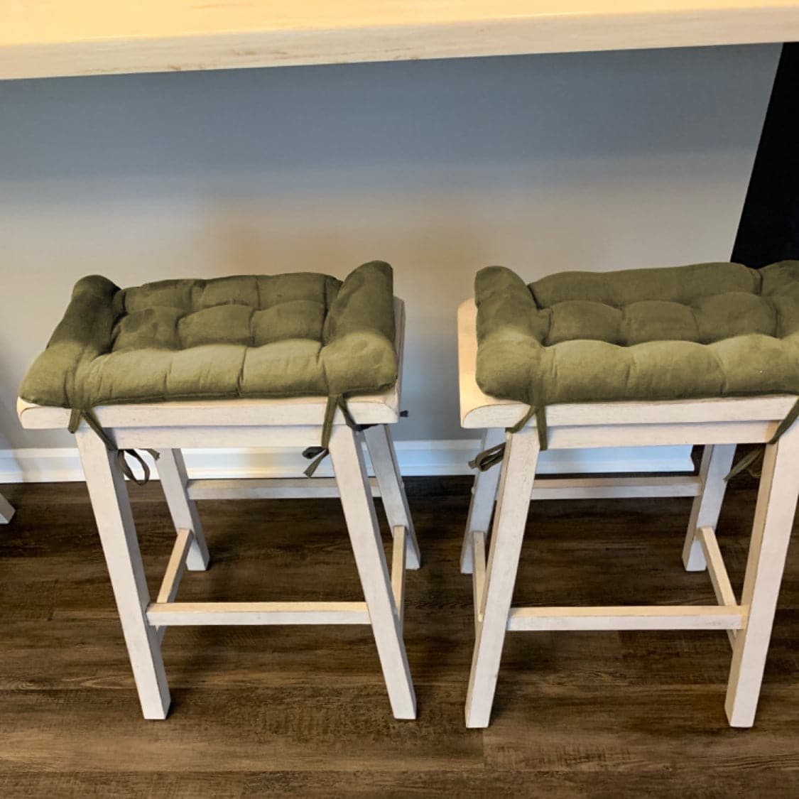 Saddle outlet stool cushions