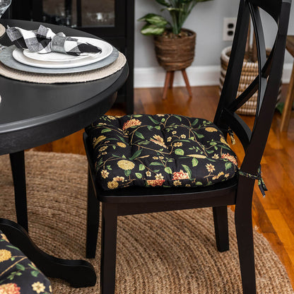 colonial Williamsburg dining room chair cushion with flowers and vines on black background