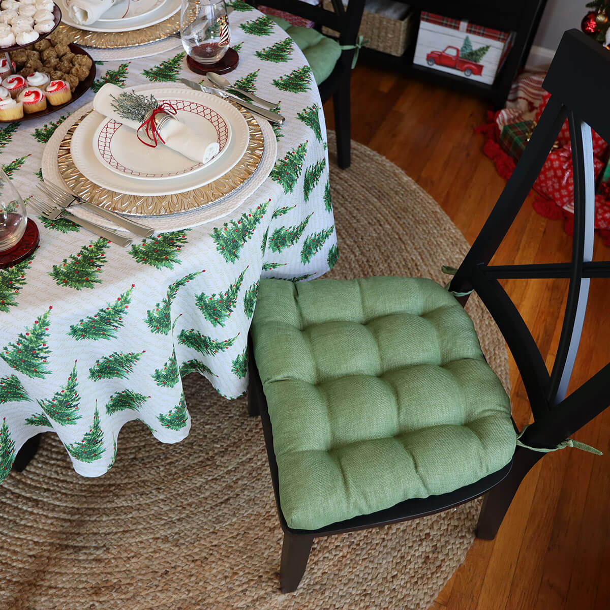 juniper green dining room chair cushions with christmas tree tablecloth