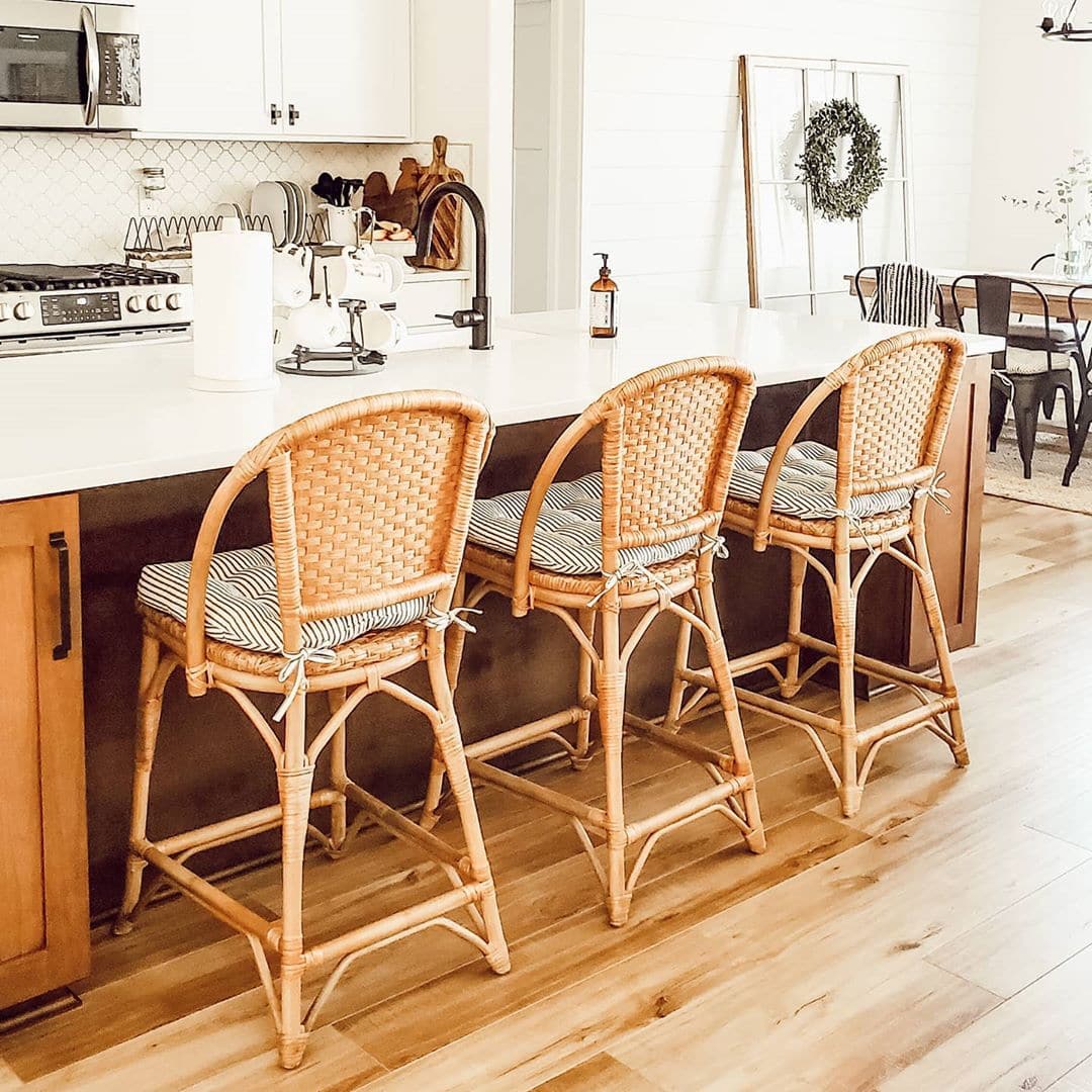 black ticking stripe chair cushions on kitchen chairs in farmhouse kitchen