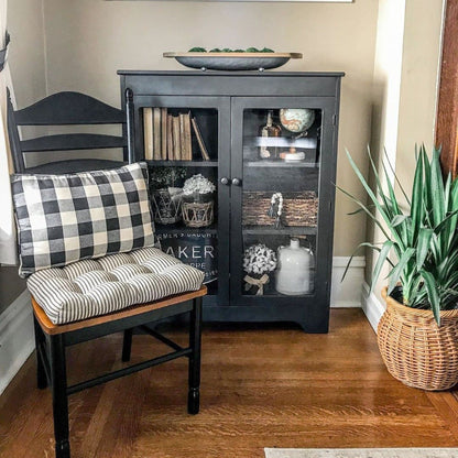 ticking stripe dining room chair cushions on black dining chairs in farmhouse style dining room